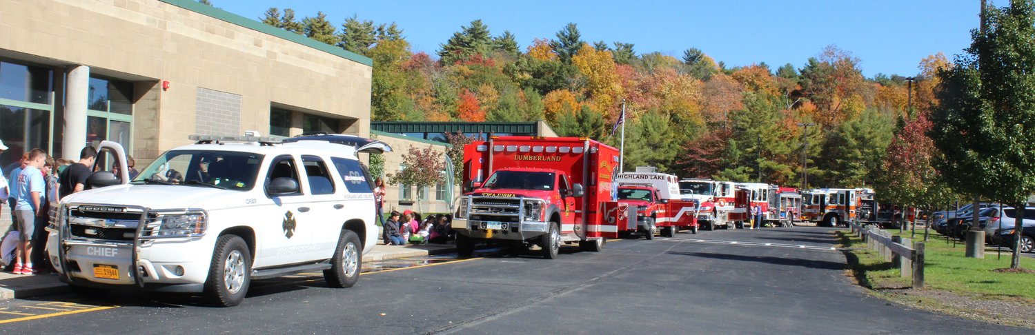 Members of the Highland Lake, Lumberland and Yulan Fire Departments visited with students at George Ross Mackenzie Elementary School at the culmination of Fire Prevention Week. ..